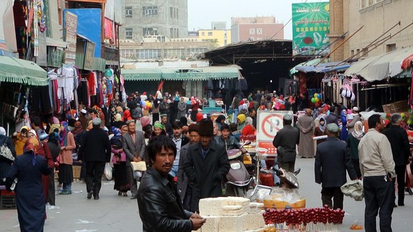 Chinese authorities offer money for mixed marriages in bid to quell Uighurs