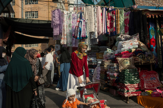 To Quell Unrest, Beijing Moves to Scatter Uighurs Across China