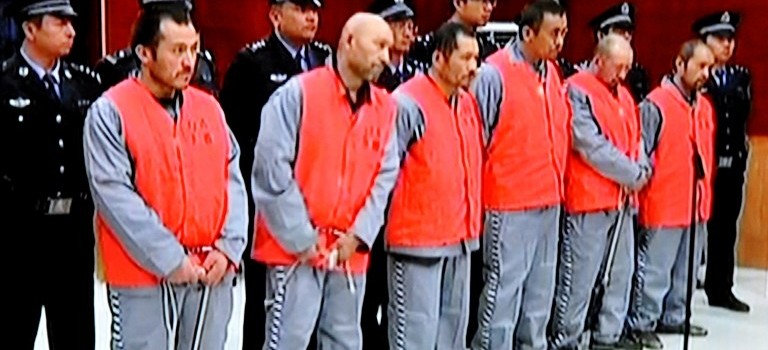 China court sentences 12 to death for Xinjiang attacks