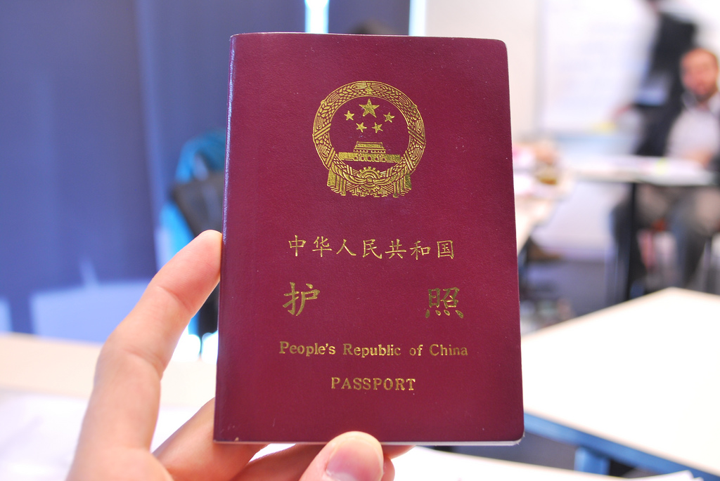 China denying passports to restrict critics, minorities