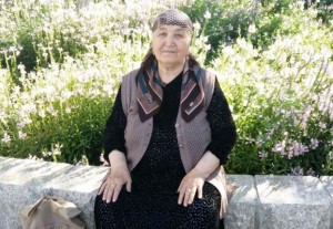 elderly-uyghur-woman-harassed-threatened-by-police